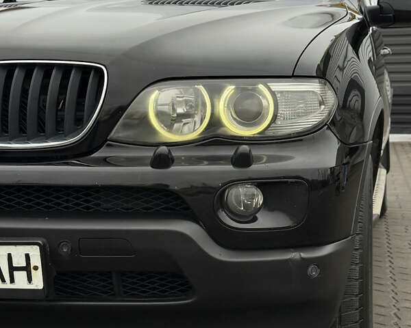 Черный БМВ Х5, объемом двигателя 3 л и пробегом 370 тыс. км за 10900 $, фото 26 на Automoto.ua