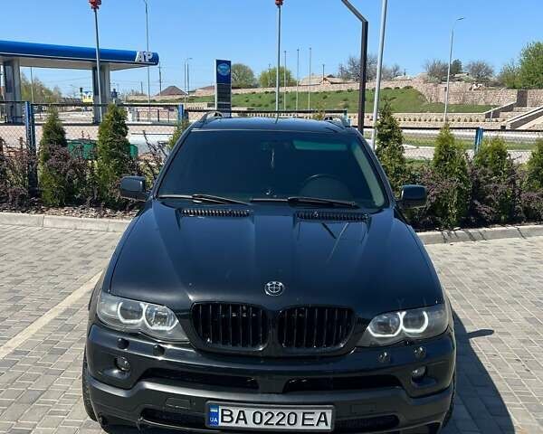 Чорний БМВ Х5, об'ємом двигуна 4.4 л та пробігом 370 тис. км за 10500 $, фото 1 на Automoto.ua