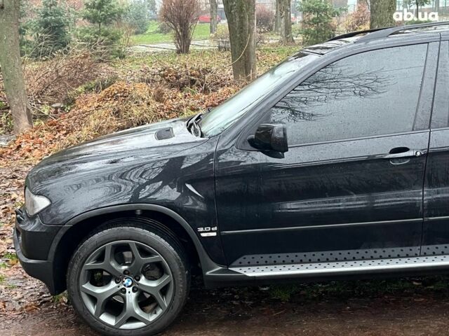 Черный БМВ Х5, объемом двигателя 3 л и пробегом 419 тыс. км за 12790 $, фото 6 на Automoto.ua