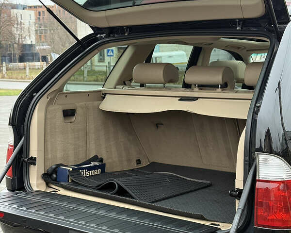 Черный БМВ Х5, объемом двигателя 3 л и пробегом 370 тыс. км за 10900 $, фото 58 на Automoto.ua