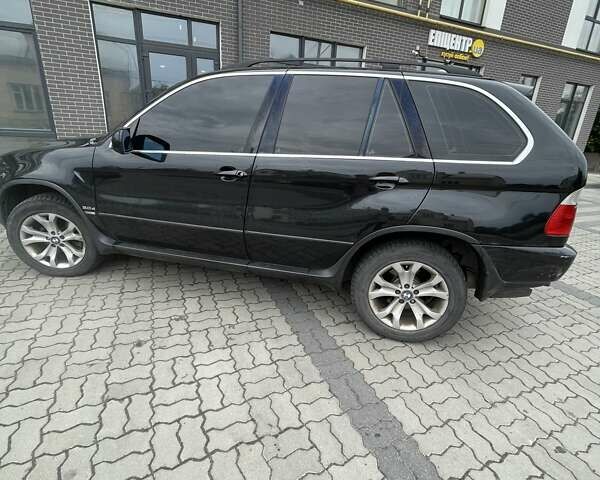 Черный БМВ Х5, объемом двигателя 3 л и пробегом 285 тыс. км за 11990 $, фото 11 на Automoto.ua