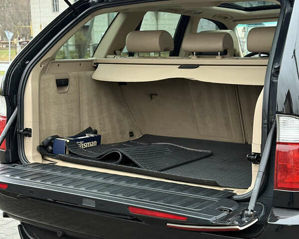 Черный БМВ Х5, объемом двигателя 3 л и пробегом 370 тыс. км за 10900 $, фото 56 на Automoto.ua