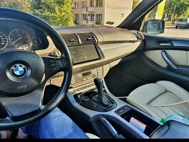 Черный БМВ Х5, объемом двигателя 3 л и пробегом 375 тыс. км за 11999 $, фото 5 на Automoto.ua