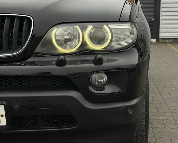 Черный БМВ Х5, объемом двигателя 3 л и пробегом 370 тыс. км за 10900 $, фото 25 на Automoto.ua