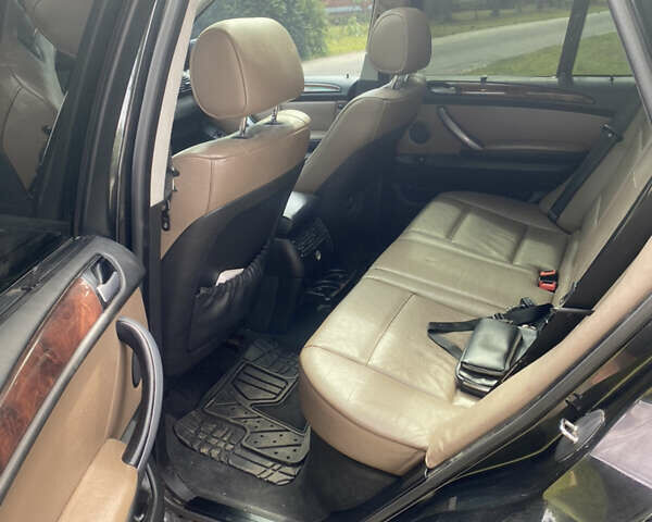 Черный БМВ Х5, объемом двигателя 3 л и пробегом 318 тыс. км за 11900 $, фото 6 на Automoto.ua