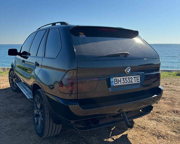 Черный БМВ Х5, объемом двигателя 3 л и пробегом 326 тыс. км за 11899 $, фото 1 на Automoto.ua