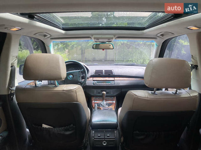 Черный БМВ Х5, объемом двигателя 3 л и пробегом 318 тыс. км за 11900 $, фото 10 на Automoto.ua