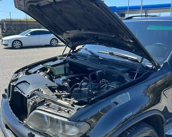 Чорний БМВ Х5, об'ємом двигуна 4.4 л та пробігом 370 тис. км за 10500 $, фото 6 на Automoto.ua
