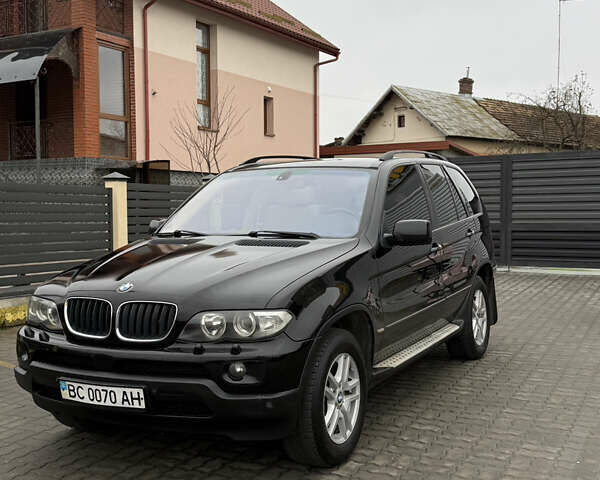 Черный БМВ Х5, объемом двигателя 3 л и пробегом 370 тыс. км за 10900 $, фото 64 на Automoto.ua