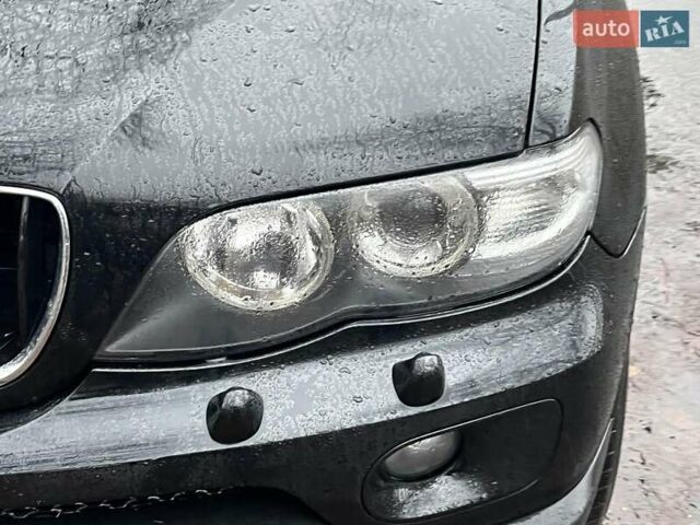 Черный БМВ Х5, объемом двигателя 3 л и пробегом 419 тыс. км за 12790 $, фото 4 на Automoto.ua