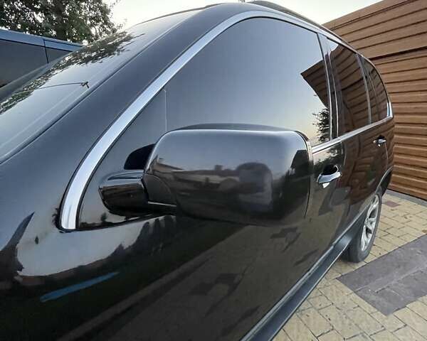 Черный БМВ Х5, объемом двигателя 3 л и пробегом 285 тыс. км за 11990 $, фото 25 на Automoto.ua