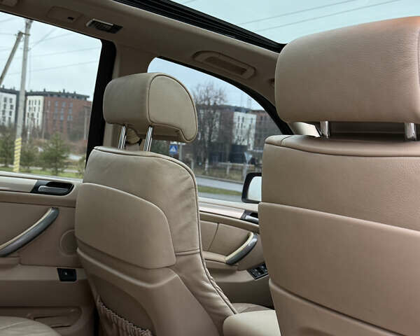 Черный БМВ Х5, объемом двигателя 3 л и пробегом 370 тыс. км за 10900 $, фото 43 на Automoto.ua