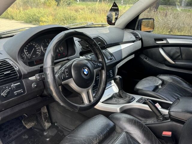 Чорний БМВ Х5, об'ємом двигуна 3 л та пробігом 300 тис. км за 4150 $, фото 6 на Automoto.ua