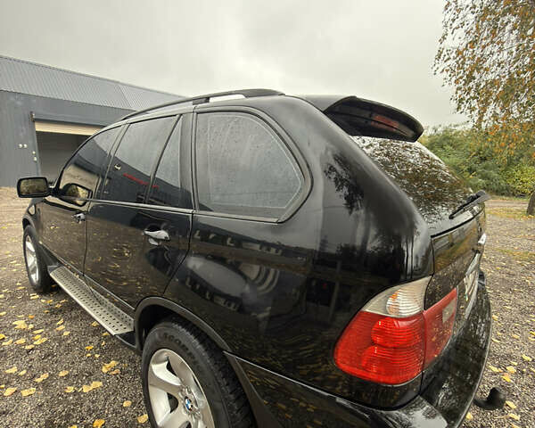 Черный БМВ Х5, объемом двигателя 3 л и пробегом 373 тыс. км за 9500 $, фото 18 на Automoto.ua