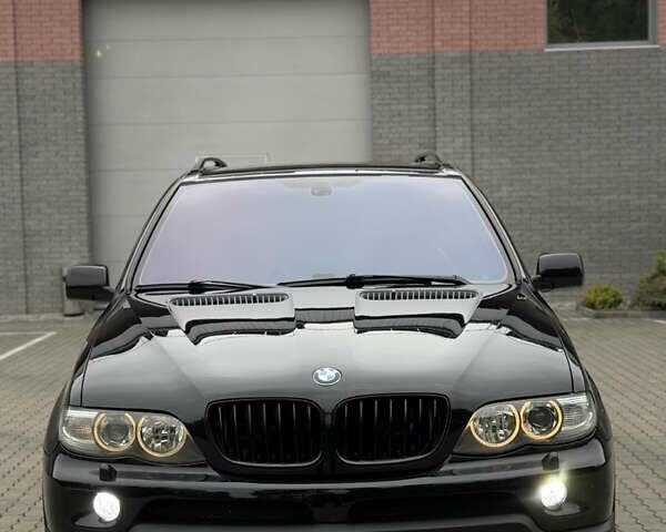 Черный БМВ Х5, объемом двигателя 3 л и пробегом 422 тыс. км за 12500 $, фото 17 на Automoto.ua