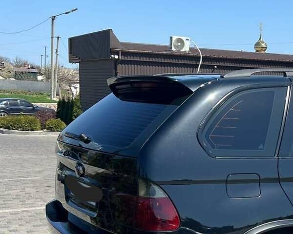 Чорний БМВ Х5, об'ємом двигуна 4.4 л та пробігом 370 тис. км за 10500 $, фото 5 на Automoto.ua