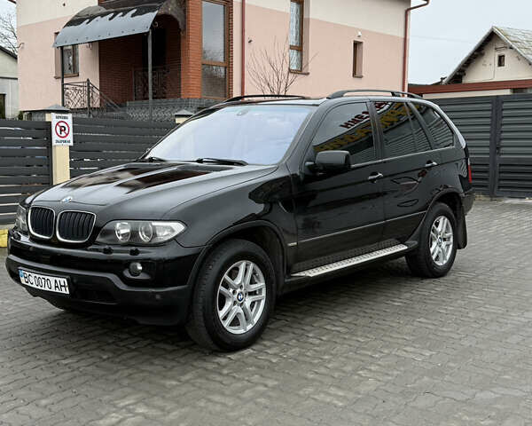 Черный БМВ Х5, объемом двигателя 3 л и пробегом 370 тыс. км за 10900 $, фото 60 на Automoto.ua