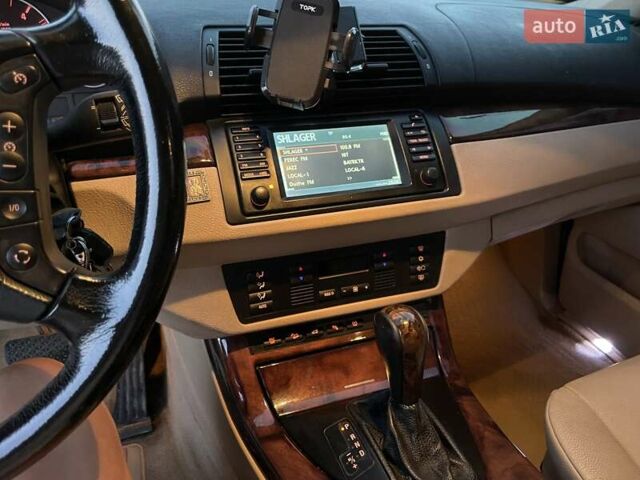 Черный БМВ Х5, объемом двигателя 3 л и пробегом 285 тыс. км за 11990 $, фото 23 на Automoto.ua