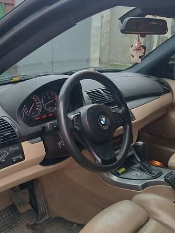 Чорний БМВ Х5, об'ємом двигуна 3 л та пробігом 350 тис. км за 13000 $, фото 4 на Automoto.ua