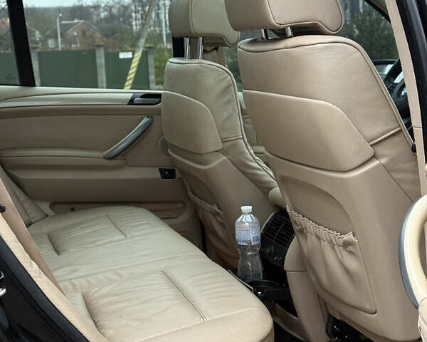 Черный БМВ Х5, объемом двигателя 3 л и пробегом 370 тыс. км за 10900 $, фото 50 на Automoto.ua