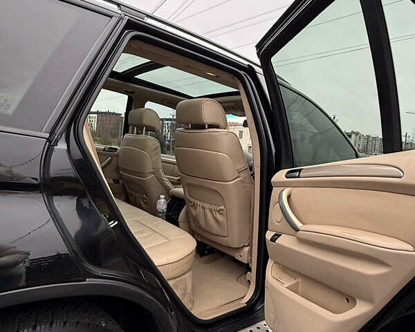 Черный БМВ Х5, объемом двигателя 3 л и пробегом 370 тыс. км за 10900 $, фото 49 на Automoto.ua