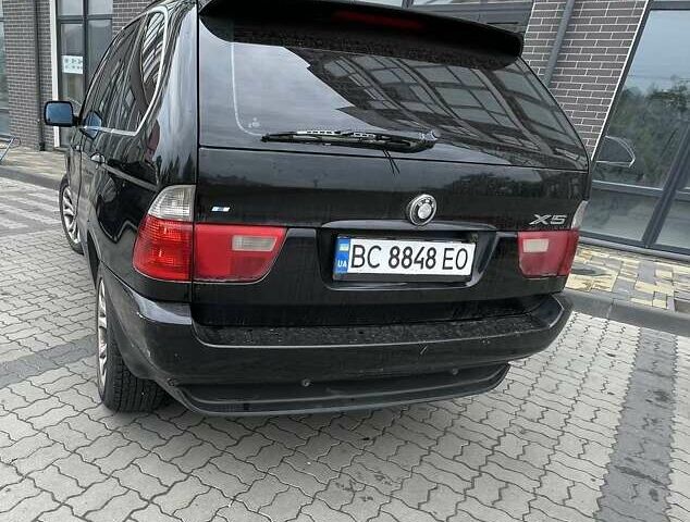 Черный БМВ Х5, объемом двигателя 3 л и пробегом 285 тыс. км за 11990 $, фото 16 на Automoto.ua