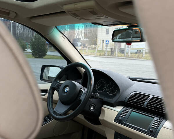 Черный БМВ Х5, объемом двигателя 3 л и пробегом 370 тыс. км за 10900 $, фото 42 на Automoto.ua