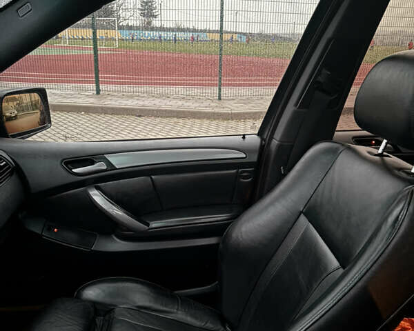 Черный БМВ Х5, объемом двигателя 2.99 л и пробегом 334 тыс. км за 11200 $, фото 47 на Automoto.ua