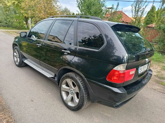 Чорний БМВ Х5, об'ємом двигуна 0 л та пробігом 390 тис. км за 5792 $, фото 3 на Automoto.ua