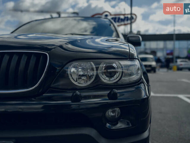Чорний БМВ Х5, об'ємом двигуна 2.99 л та пробігом 417 тис. км за 12500 $, фото 17 на Automoto.ua