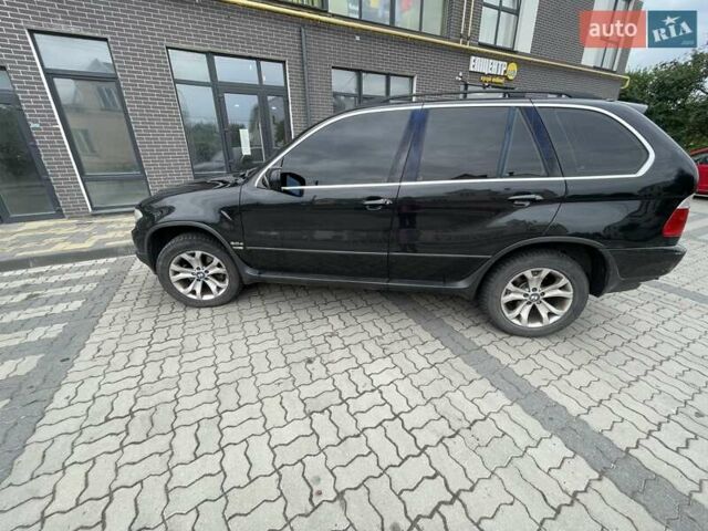Черный БМВ Х5, объемом двигателя 3 л и пробегом 285 тыс. км за 11990 $, фото 18 на Automoto.ua