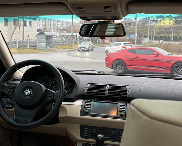 Черный БМВ Х5, объемом двигателя 3 л и пробегом 370 тыс. км за 10900 $, фото 44 на Automoto.ua