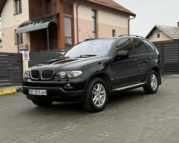 Черный БМВ Х5, объемом двигателя 3 л и пробегом 370 тыс. км за 10900 $, фото 62 на Automoto.ua