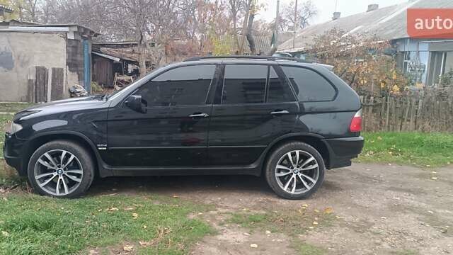 Чорний БМВ Х5, об'ємом двигуна 3 л та пробігом 350 тис. км за 13000 $, фото 2 на Automoto.ua