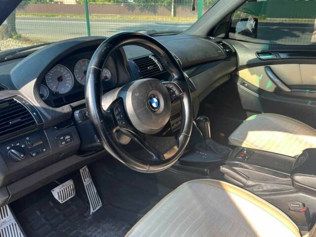 Чорний БМВ Х5, об'ємом двигуна 4.8 л та пробігом 280 тис. км за 13300 $, фото 10 на Automoto.ua