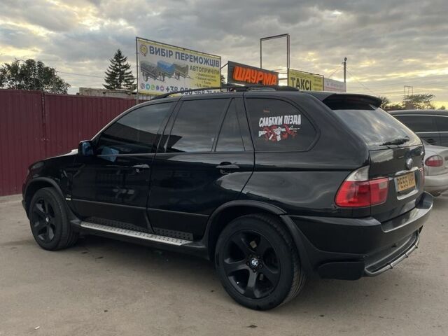 Черный БМВ Х5, объемом двигателя 3 л и пробегом 3 тыс. км за 5500 $, фото 4 на Automoto.ua