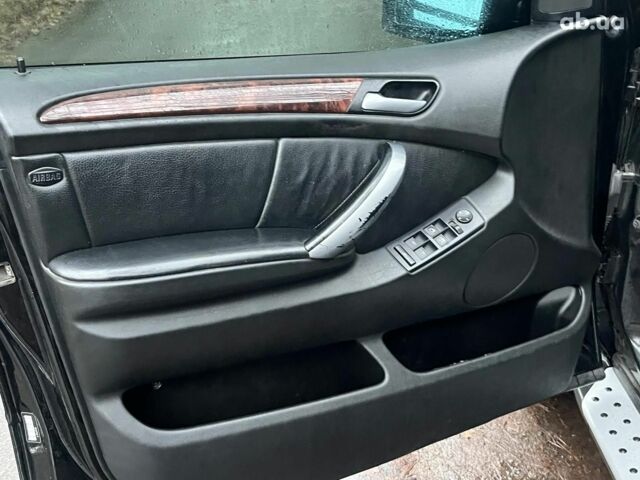 Черный БМВ Х5, объемом двигателя 3 л и пробегом 419 тыс. км за 12790 $, фото 20 на Automoto.ua