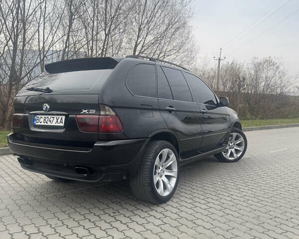 Чорний БМВ Х5, об'ємом двигуна 2.99 л та пробігом 297 тис. км за 12999 $, фото 84 на Automoto.ua