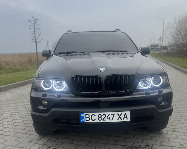 Чорний БМВ Х5, об'ємом двигуна 2.99 л та пробігом 297 тис. км за 12999 $, фото 76 на Automoto.ua