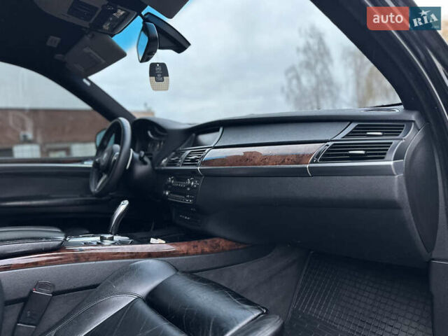 Черный БМВ Х5, объемом двигателя 3 л и пробегом 270 тыс. км за 12250 $, фото 92 на Automoto.ua