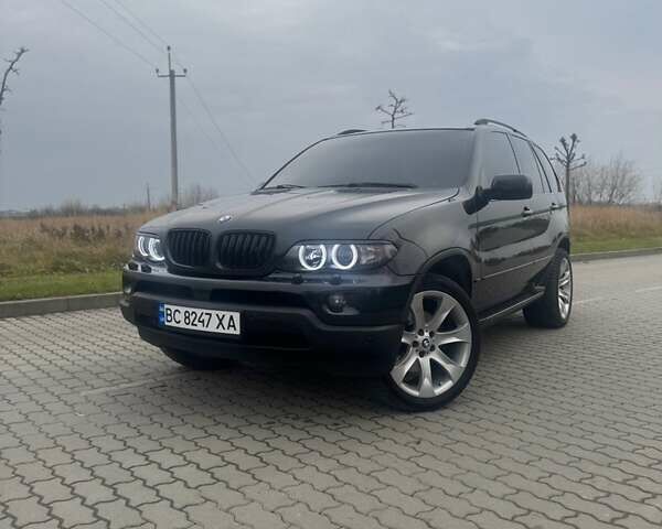 Чорний БМВ Х5, об'ємом двигуна 2.99 л та пробігом 297 тис. км за 12999 $, фото 1 на Automoto.ua