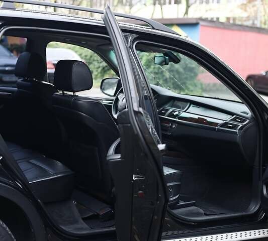 Черный БМВ Х5, объемом двигателя 3 л и пробегом 153 тыс. км за 14000 $, фото 1 на Automoto.ua