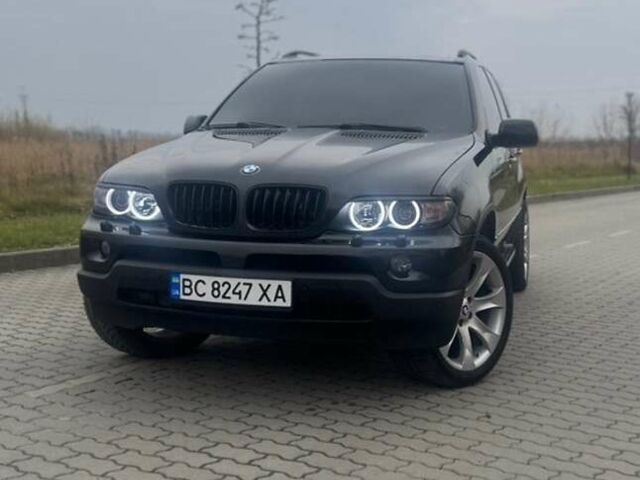 Чорний БМВ Х5, об'ємом двигуна 2.99 л та пробігом 297 тис. км за 12999 $, фото 2 на Automoto.ua