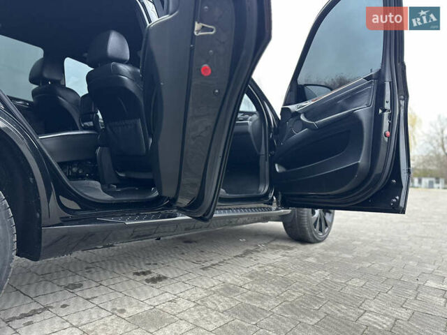 Черный БМВ Х5, объемом двигателя 3 л и пробегом 270 тыс. км за 12250 $, фото 87 на Automoto.ua