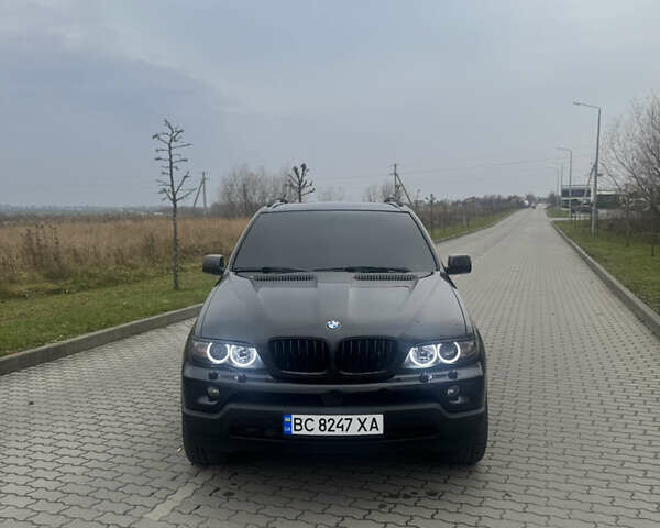 Чорний БМВ Х5, об'ємом двигуна 2.99 л та пробігом 297 тис. км за 12999 $, фото 78 на Automoto.ua