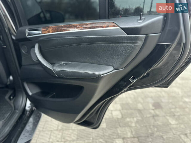 Черный БМВ Х5, объемом двигателя 3 л и пробегом 270 тыс. км за 12250 $, фото 83 на Automoto.ua