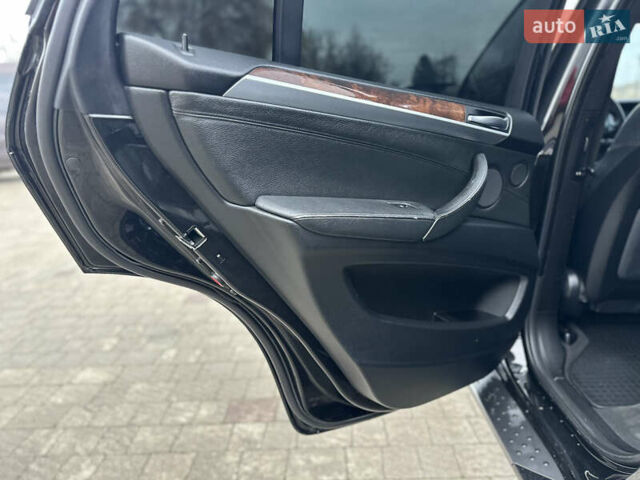 Черный БМВ Х5, объемом двигателя 3 л и пробегом 270 тыс. км за 12250 $, фото 70 на Automoto.ua