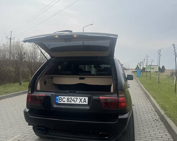 Чорний БМВ Х5, об'ємом двигуна 2.99 л та пробігом 297 тис. км за 12999 $, фото 70 на Automoto.ua