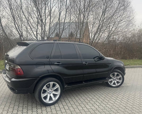 Чорний БМВ Х5, об'ємом двигуна 2.99 л та пробігом 297 тис. км за 12999 $, фото 23 на Automoto.ua