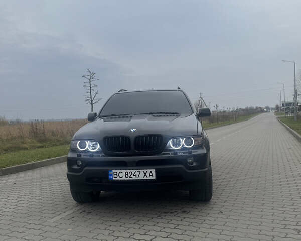 Чорний БМВ Х5, об'ємом двигуна 2.99 л та пробігом 297 тис. км за 12999 $, фото 77 на Automoto.ua